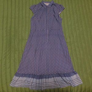 Sleeveless polyester sheath dress with ruffled hem